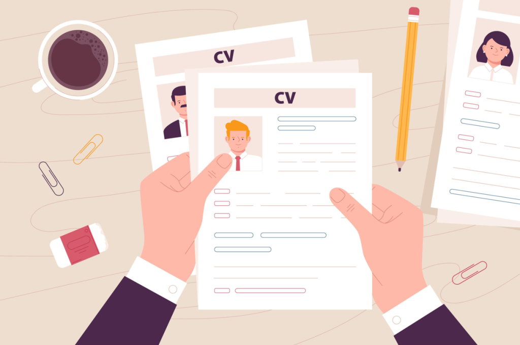 Traducción de currículos frente a localización de currículos: ¿cuál es la diferencia? 3 Un empleador revisa varios currículos.