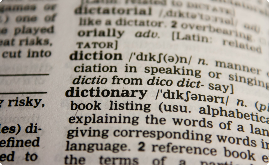 Closeup of of dictionary text symbolizing English to Russian translation.