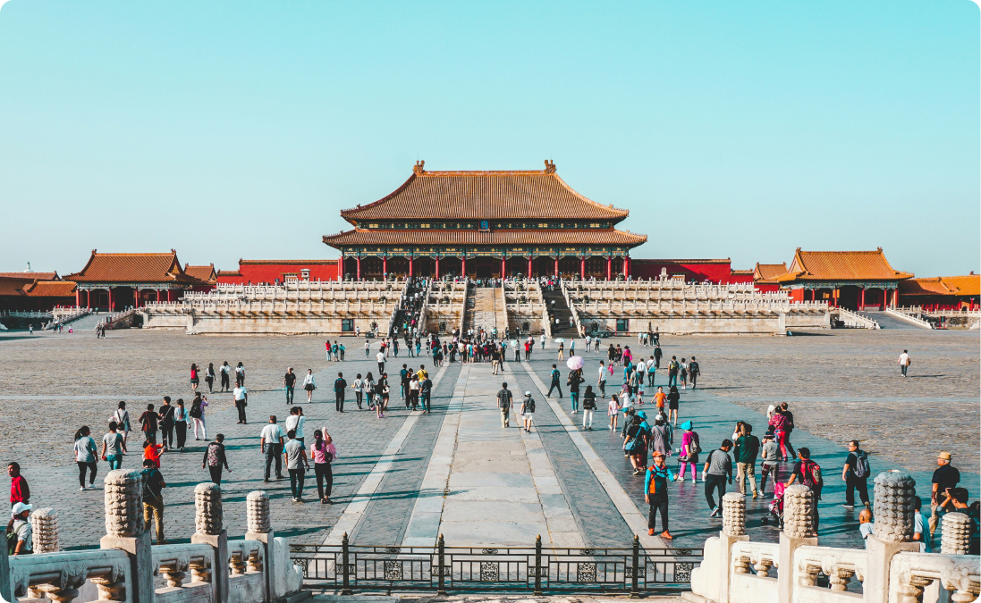 Visitors at the Forbidden City in China representing a traditional Chinese translation and other language quality translations.