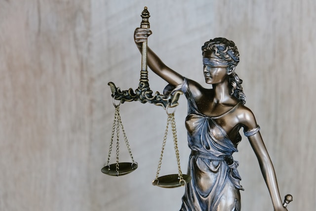 Legal Document Translation: Lawyering in Multiple Languages 9 A small Lady Justice statue.