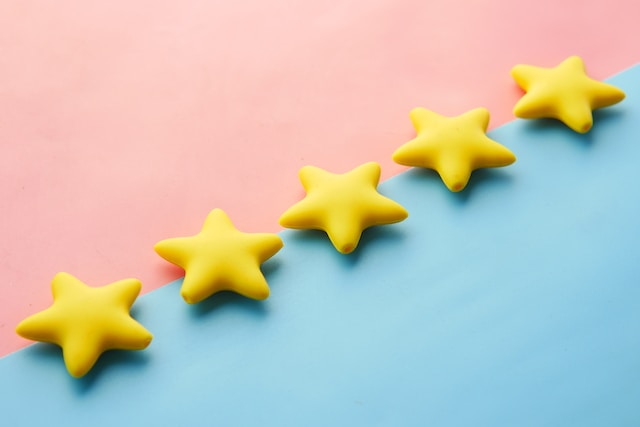 An illustration of five yellow stars representing review ratings.