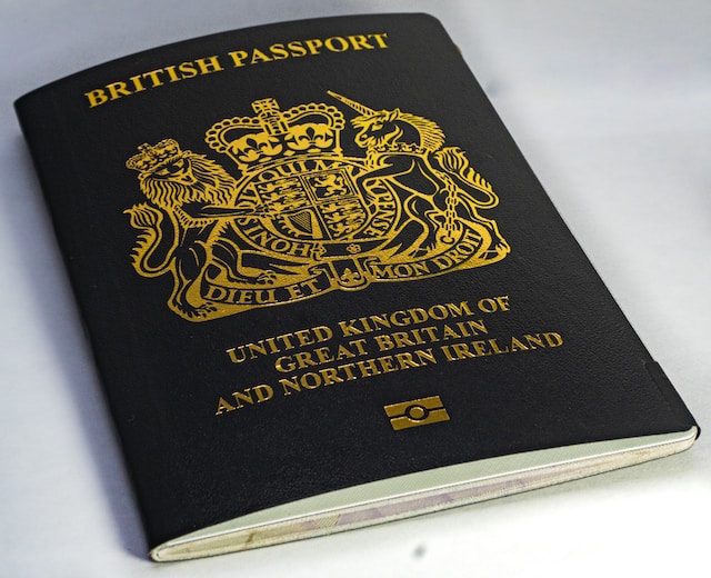 A picture of the British Passport on a white surface.