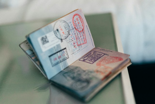 UKVI Translation: Get Your Papers Ready for UK Visa Success 6 A picture of an open passport with stamped pages.