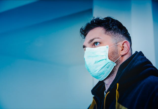 Medical Translator Certification: Obtaining This Credential 6 A photograph of a person wearing a face mask.