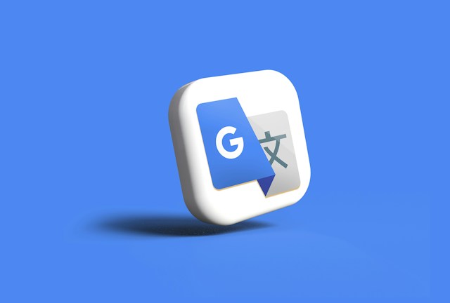 A 3D image of Google Translate’s icon on a white cube placed on a blue background. 