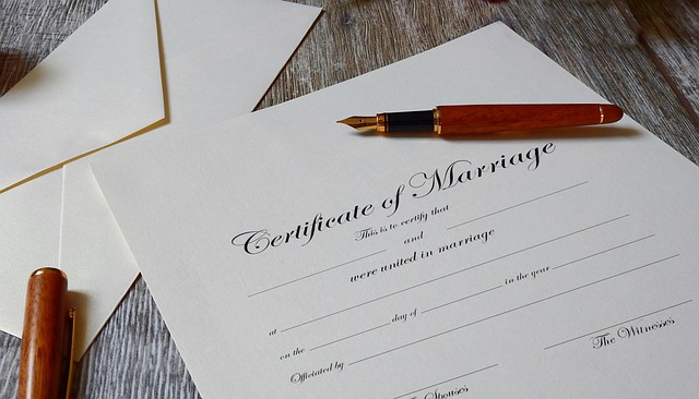 An empty certificate of marriage form on paper.
