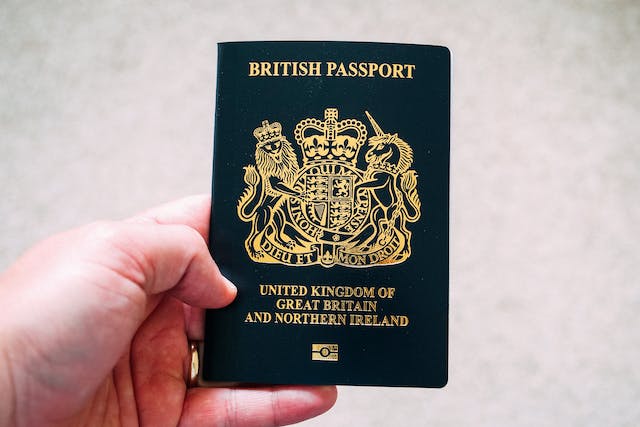 A person holding a British Passport.