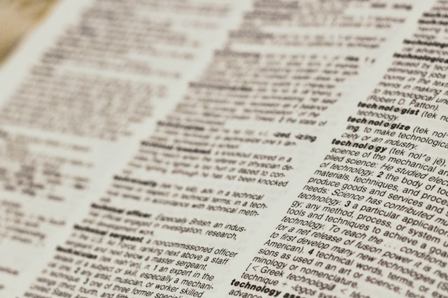 A closeup shot of a dictionary page that shows the definition of “Technology.