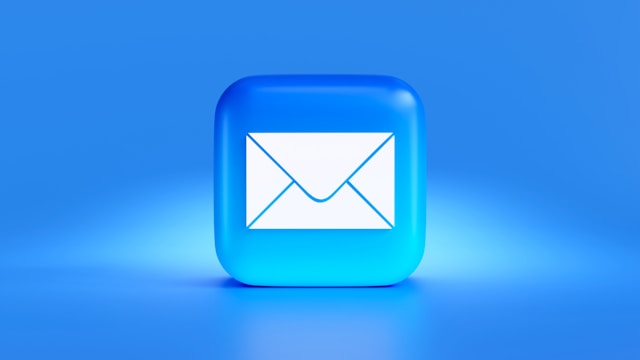 A white envelope on a blue background. 
