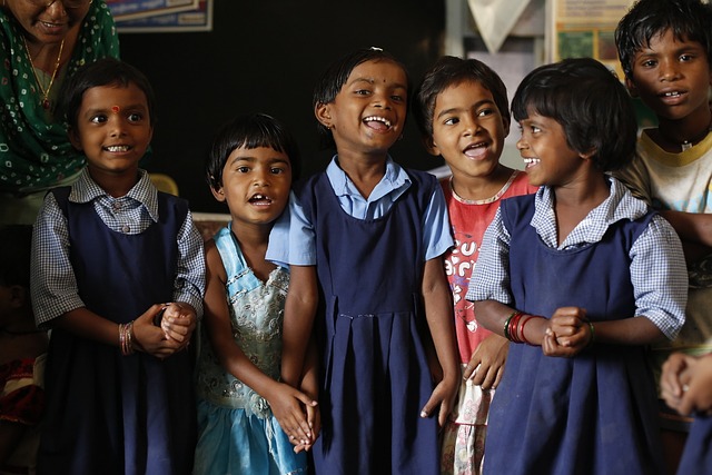Education Translation Services: The Ultimate Guide 3 Students stand together in their school uniform.
