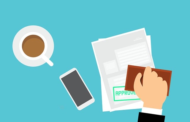 Approved Translation Services for USA Agencies 3 An illustration in which a hand places an approval stamp on a document.