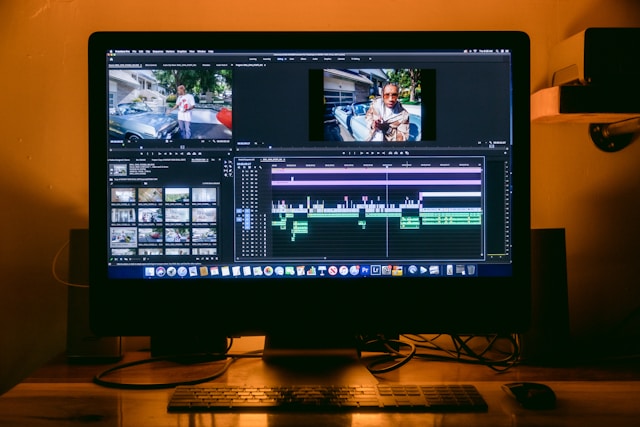 Movie Translator: The Best Tools To Use 6 A computer setup for video editing on a desk.