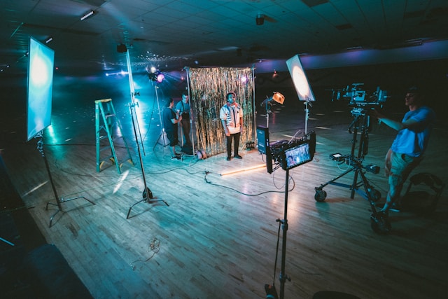 Movie Translator: The Best Tools To Use 5 A movie production scene with several video equipment.