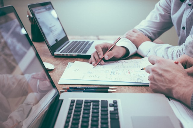 Affordable Translation Services for Accurate Translations 3 Two people work together on a document translation task.