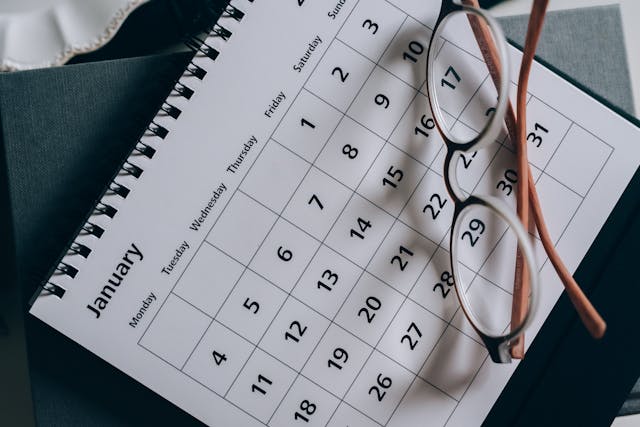 Can I Get a Birth Certificate Same Day? How Possible Is It? 5 A pair of glasses on a calendar.